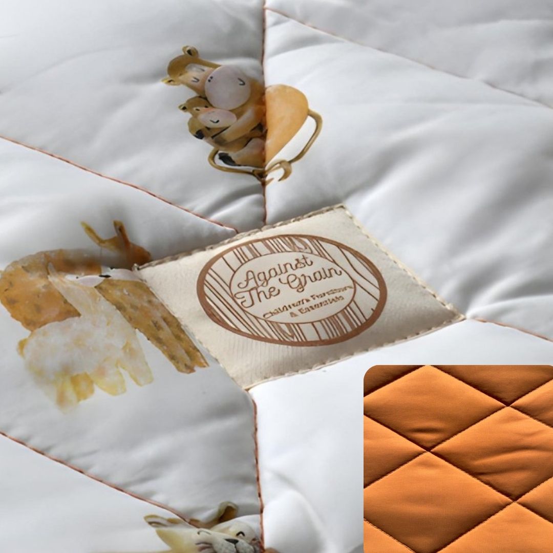 Safari-themed baby play mat made from certified organic cotton